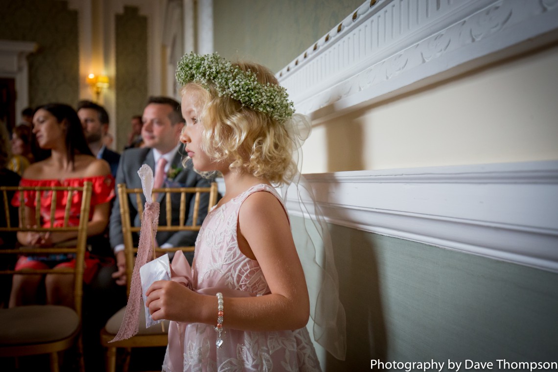 Flower girl watches the wedding ceremony at Crewe Municipal Buildings