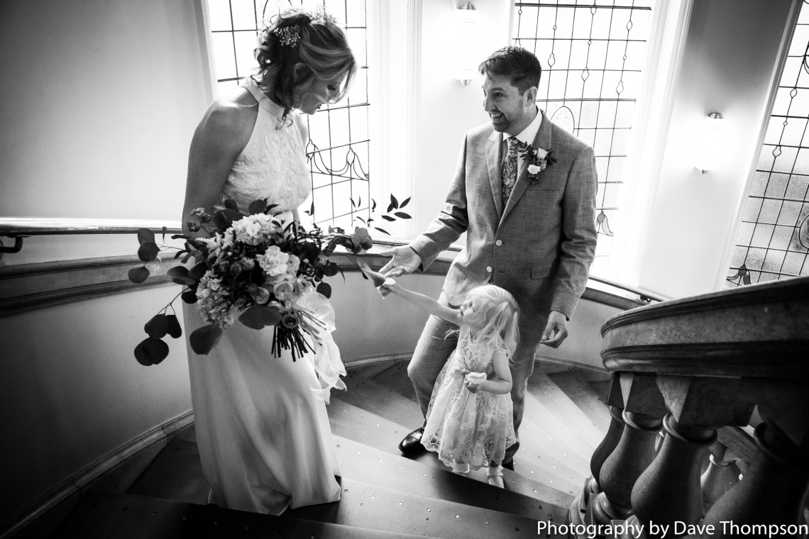 Bridal family portrait in the stone stairs at Crewe Municipal buildings