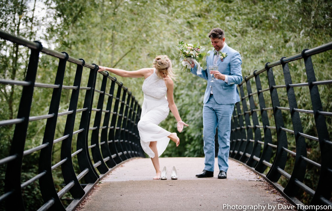 Bride removing her shoes