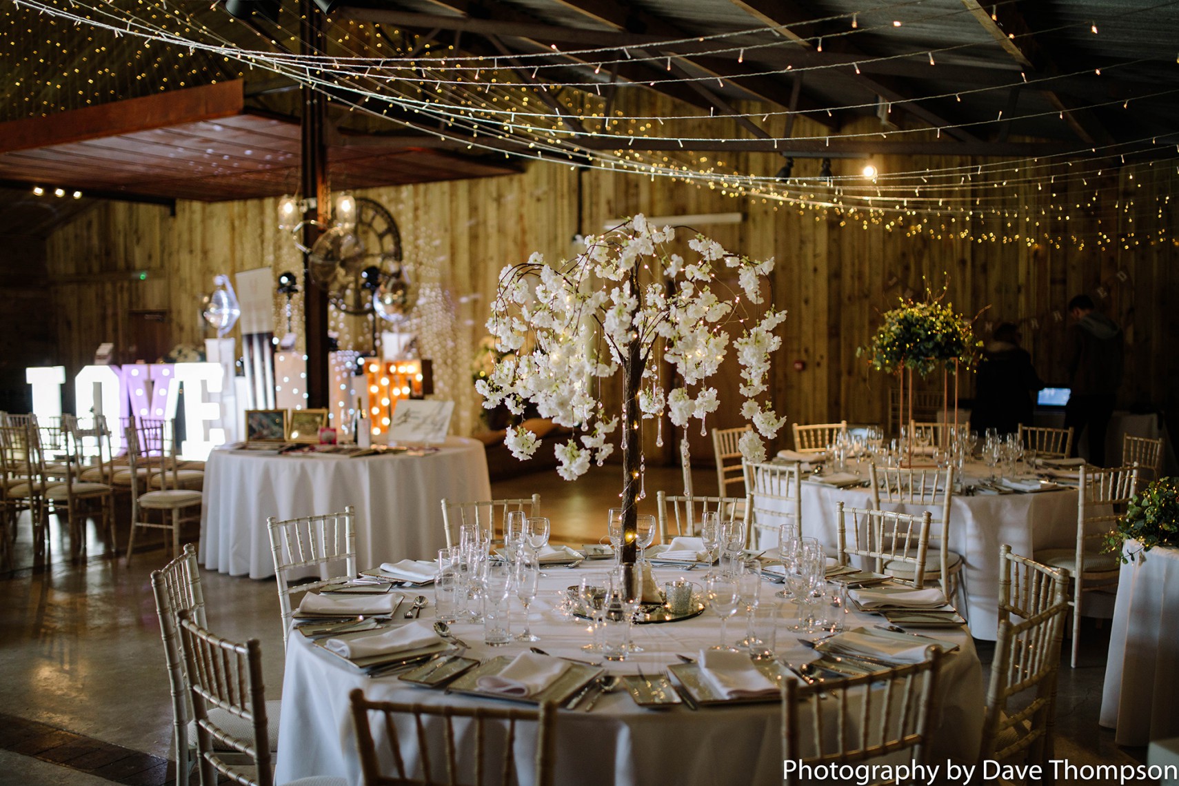 Tables dressed for a wedding at Alcumlow Wedding Barn