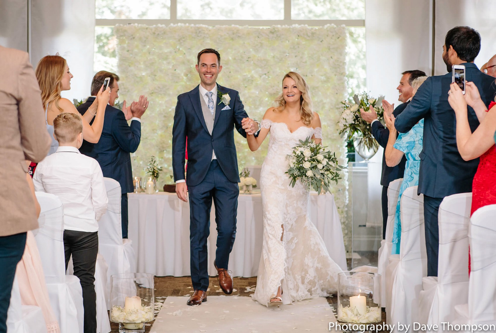 The happy couple walk back down the aisle