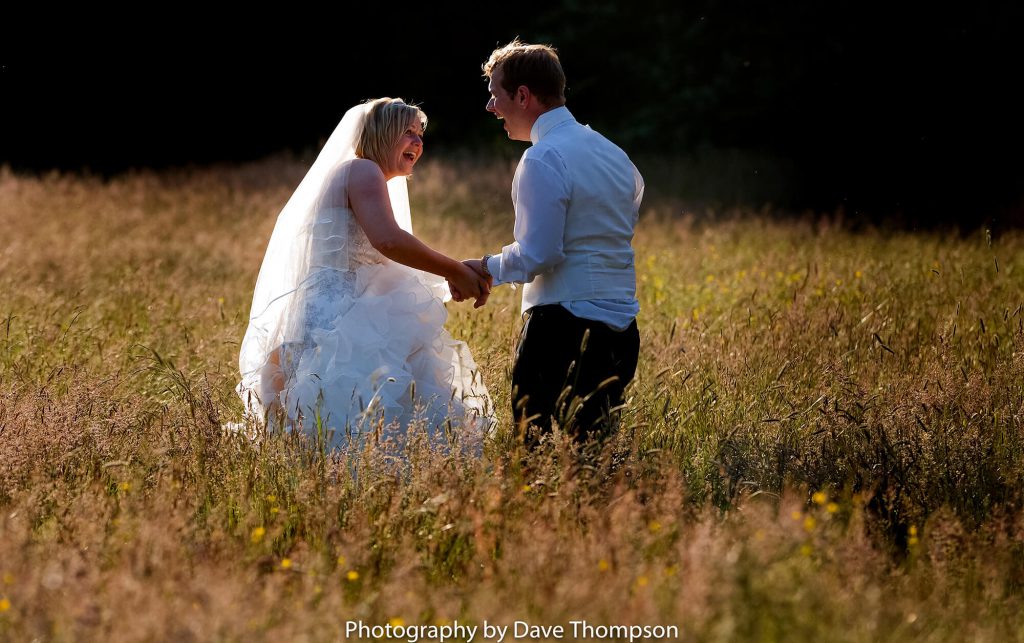 The bride and groom in the evening sunlight