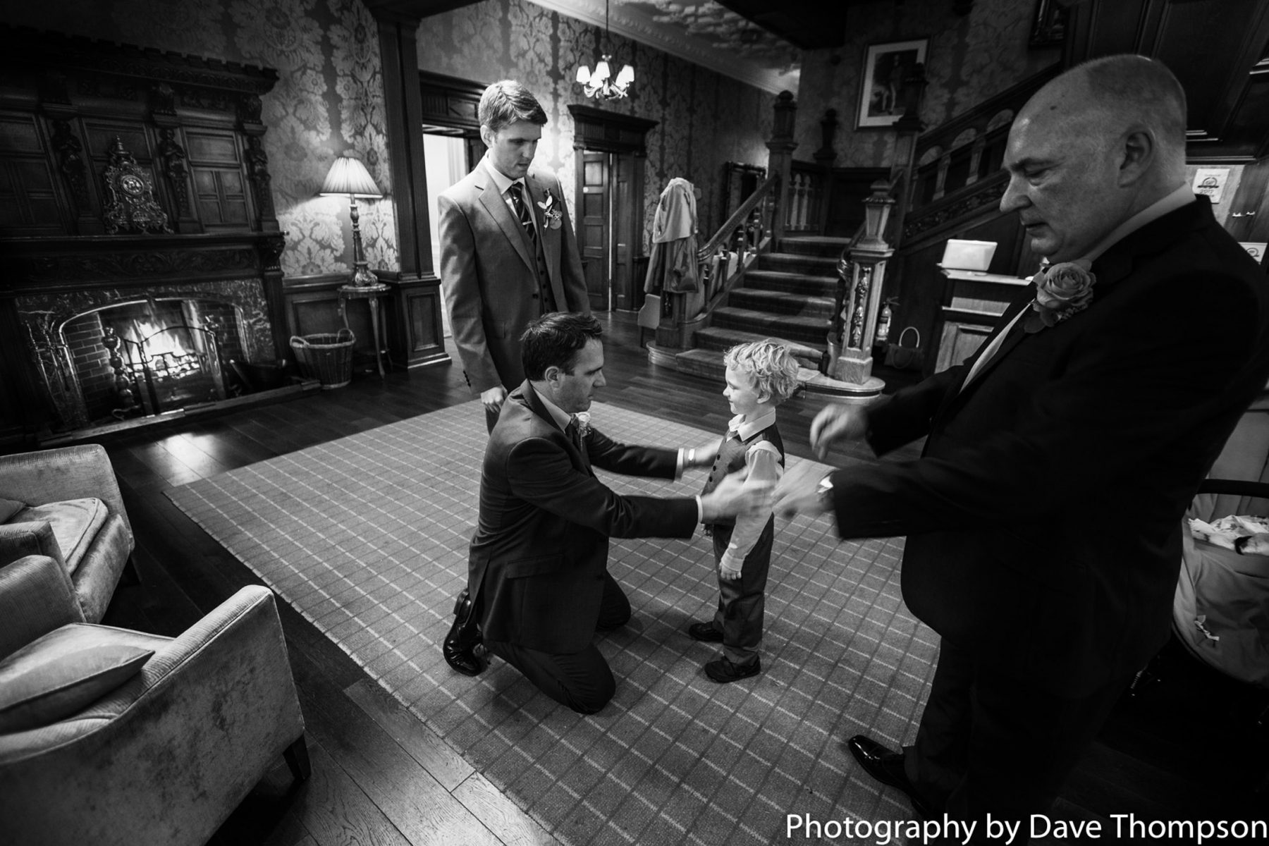The Bets man helps his son with his suit