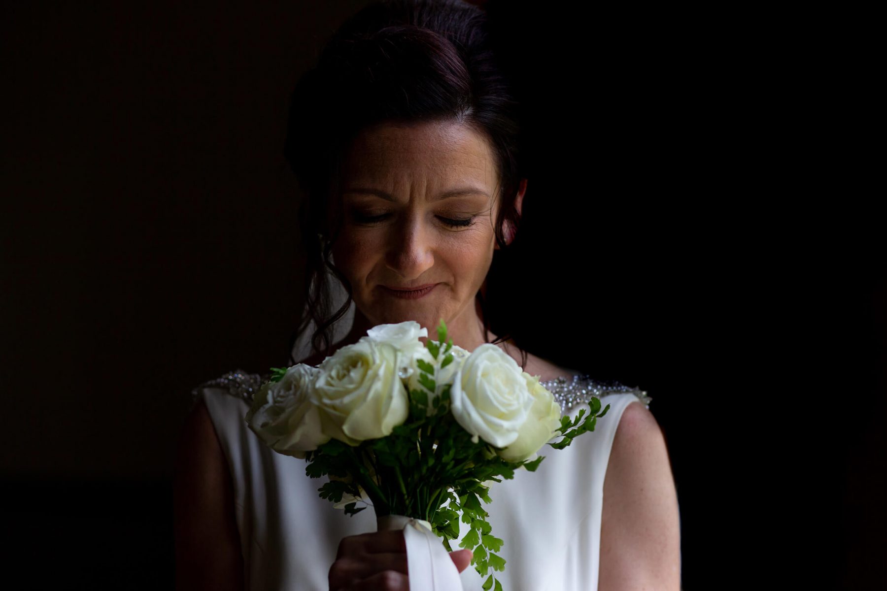 A bride holds her bouquet.
