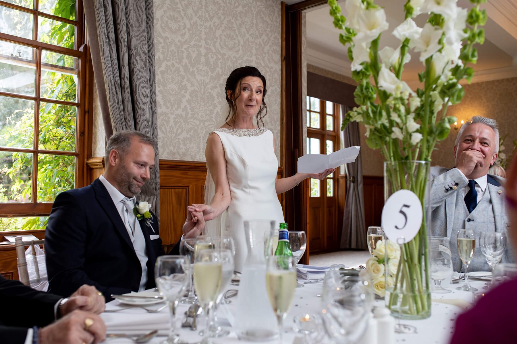The bride delivers her speech during the wedding breakfast