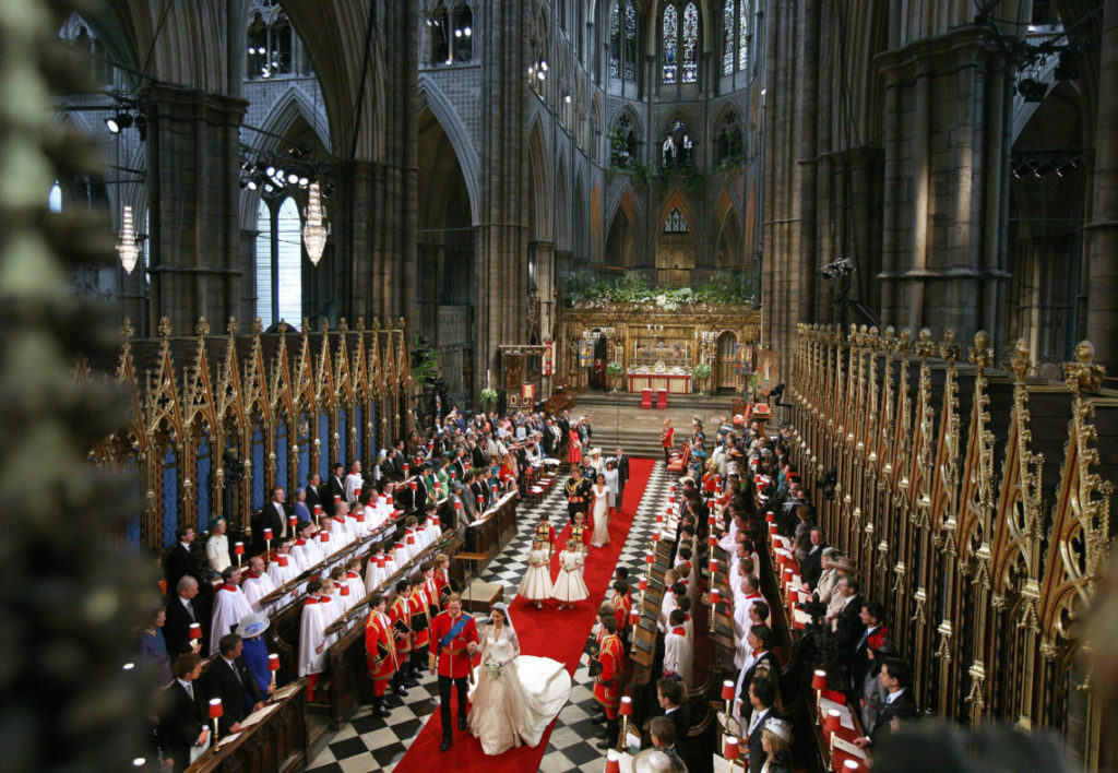 The bride and groom leave Westminster Abbey after their wedding