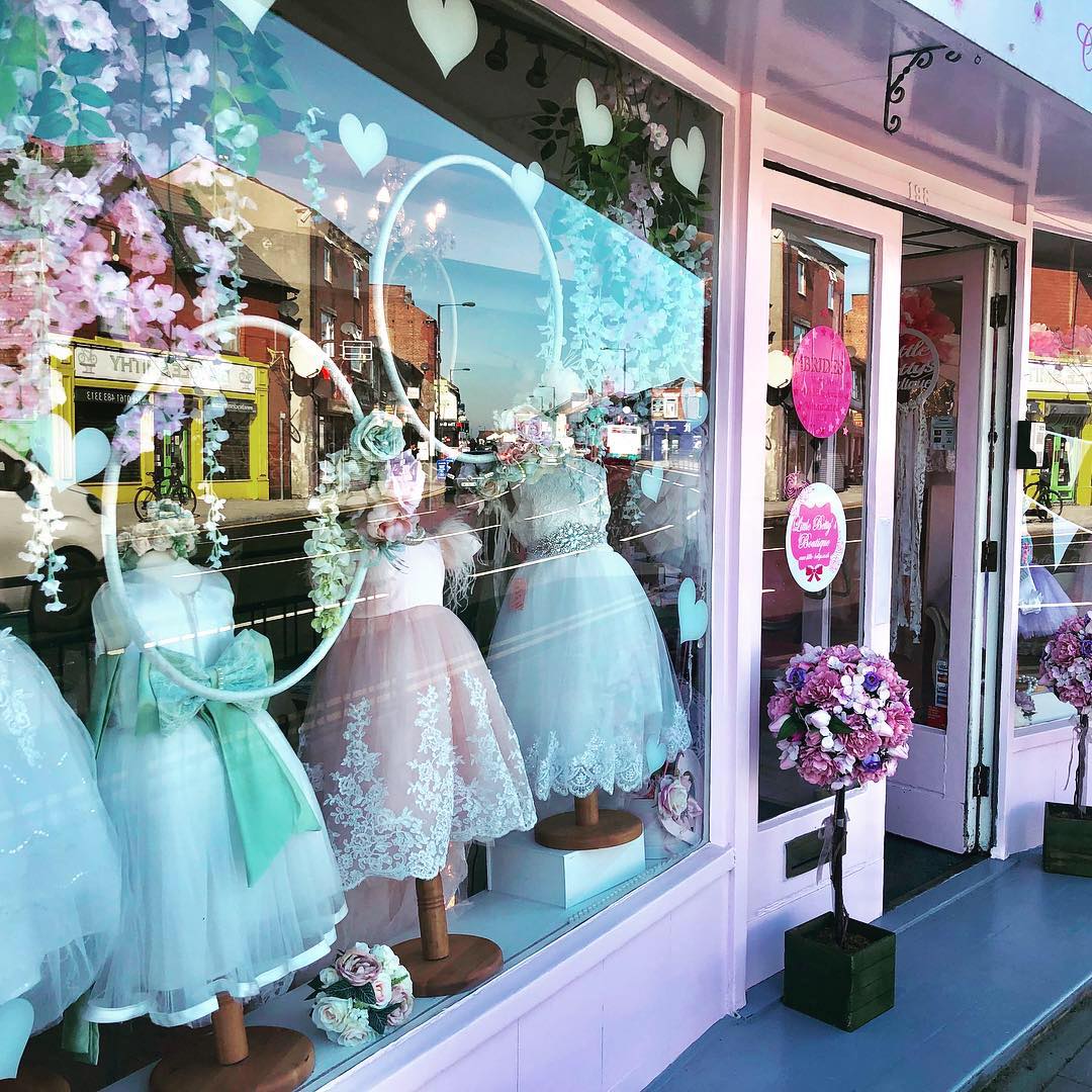 The exterior window of Little Betty's boutique in Hazel Grovw who suppliy flower girl dresses and communion dresses
