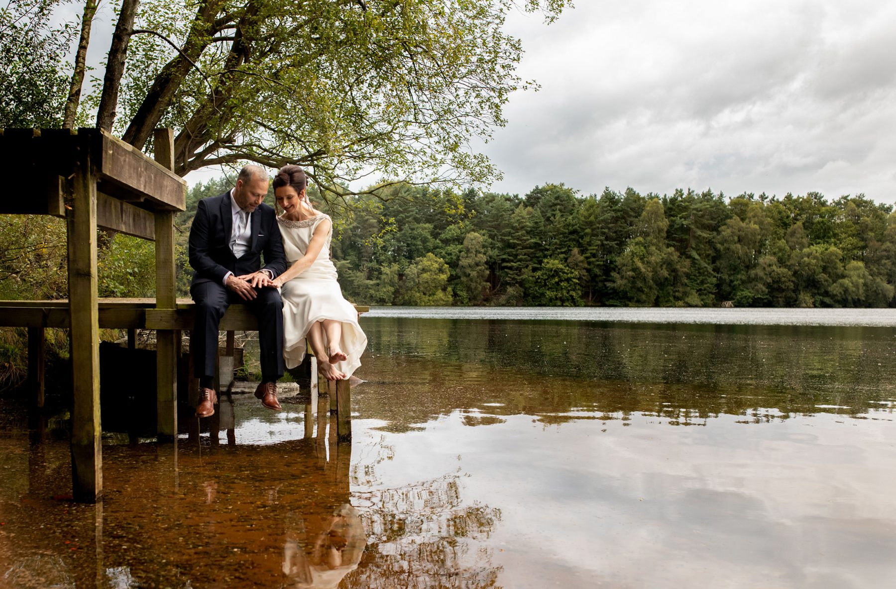 Down by Nunsmere Lake, the bride and groom have time together