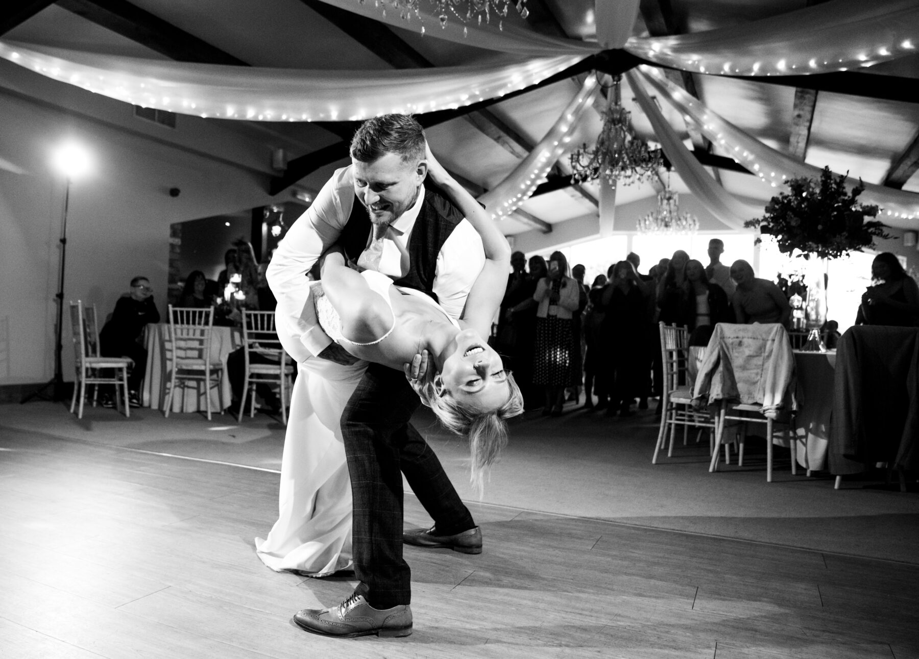 A bride and groom during their first dance at Hyde Bank Farm, a wedding venue near Stockport.